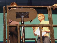 Jugi of Aisth collecting his reward after their victory in the vocal music competition.